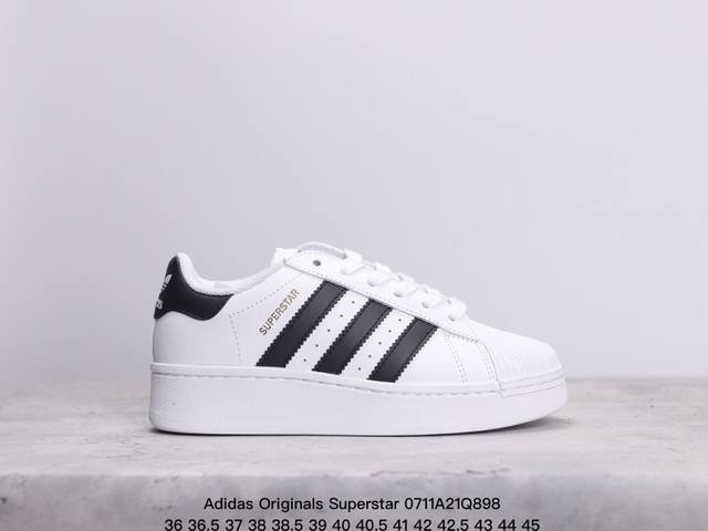 公司级adidas Originals Superstar Xlg 贝壳头系列低帮厚底松糕经典百搭休闲运动板鞋 以现代时尚元素焕新演绎的经典运动鞋当你试图定义a