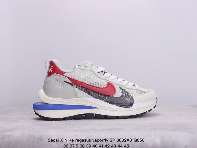 耐克sacai X Nike Regasus Vaporrly Sp 华夫双勾三代3.0走秀 鞋身材质由翻毛皮和透气网布共同打造。熟悉的解构手法、重叠swoos