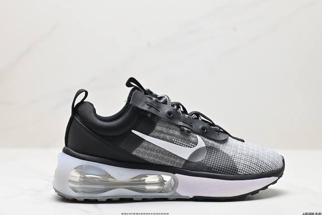 公司级air Max 半掌气垫运动鞋 机能风 该鞋款以黑色、铁灰色和白色的组合示人 酷感十足 鞋款最大亮点是足底和空心泡沫中底的新型air缓震装置 带来了更为轻