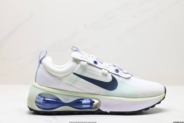 公司级air Max 半掌气垫运动鞋 机能风 该鞋款以黑色、铁灰色和白色的组合示人 酷感十足 鞋款最大亮点是足底和空心泡沫中底的新型air缓震装置 带来了更为轻