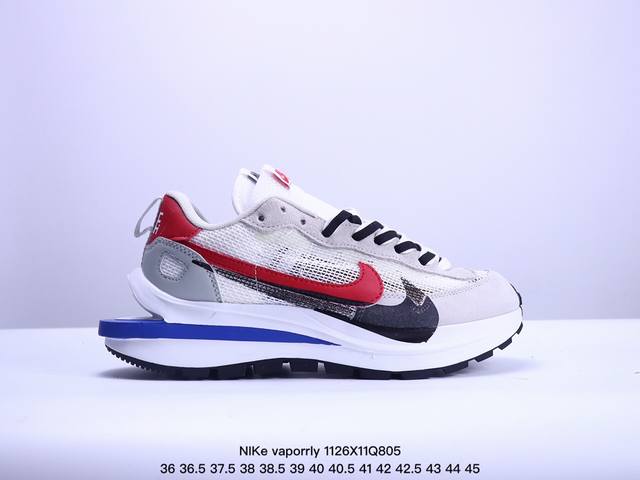 耐克sacai X Nike Regasus Vaporrly Sp 华夫双勾三代3.0走秀 鞋身材质由翻毛皮和透气网布共同打造。熟悉的解构手法、重叠swoos