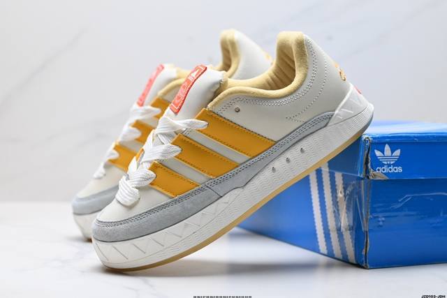 公司级adidas Adimatic Low 马蒂奇系列低帮 复古鲨鱼面包鞋运动休闲滑板板鞋 整个鞋面由色彩艳丽的麂皮制成 搭配品牌标志性大尺寸三条纹 Logo